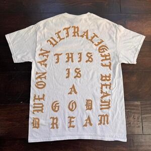 White and gold Kanye West "Ultralight Beam" graphic tee